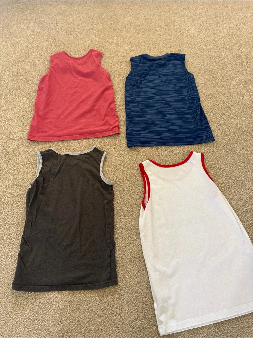 Bundle of boys tank tops size 10.